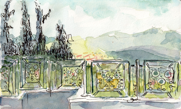 Maalot hills behind sunflower fence