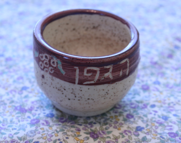 kiddush cup with borei pri hagefen, pottery with slip decoration